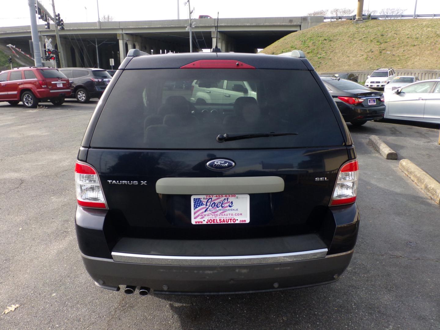 2008 Blue Ford Taurus X SEL FWD (1FMDK02W18G) with an 3.5L V6 DOHC 24V engine, 6-Speed Automatic Overdrive transmission, located at 5700 Curlew Drive, Norfolk, VA, 23502, (757) 455-6330, 36.841885, -76.209412 - Photo#12